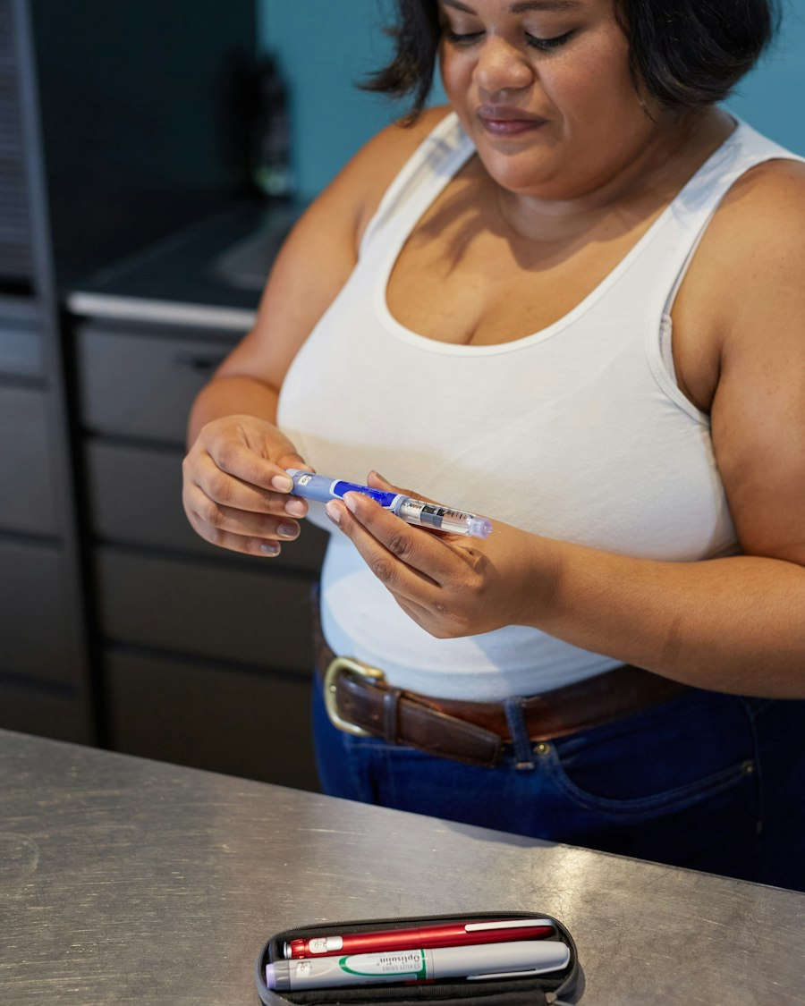 Patient using a once-weekly tirzepatide injection pen